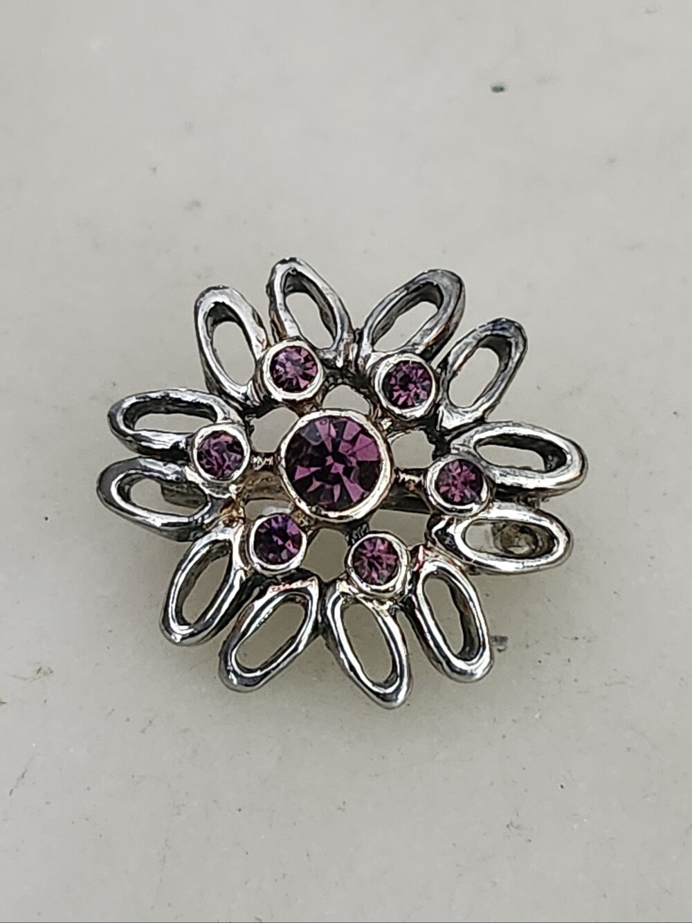 Silver Floral Crystal Brooch with Purple Stones